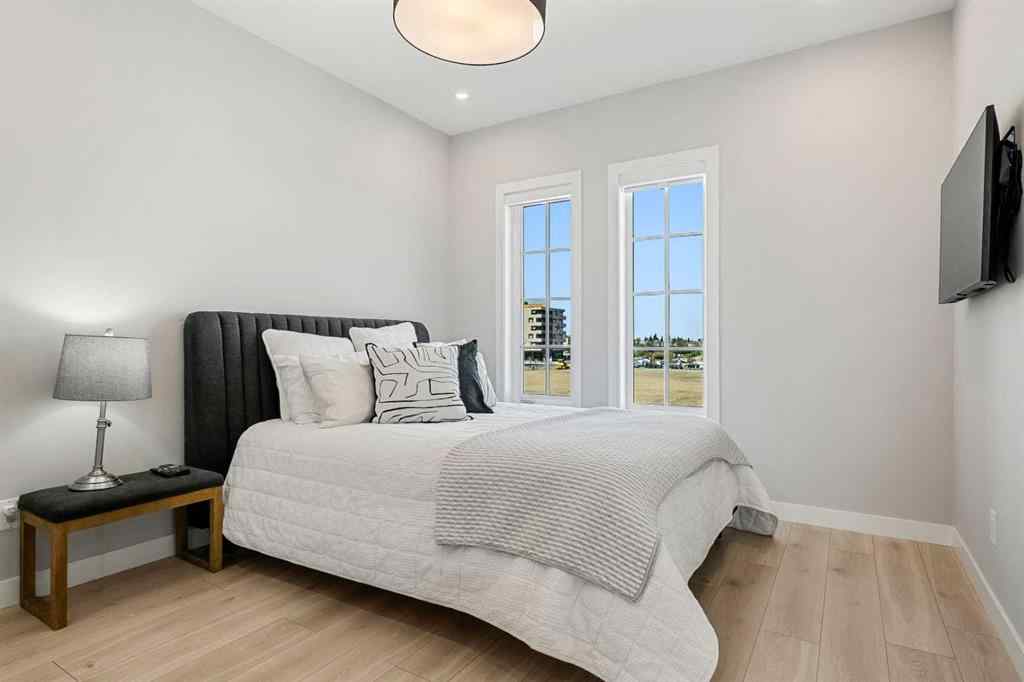 MLS® A2262942 - 8149 8 Avenue SW in West Springs Calgary, Residential