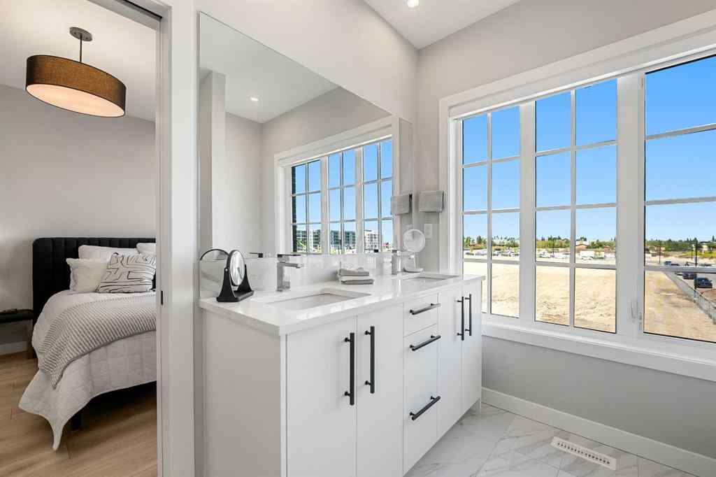 MLS® A2262942 - 8149 8 Avenue SW in West Springs Calgary, Residential