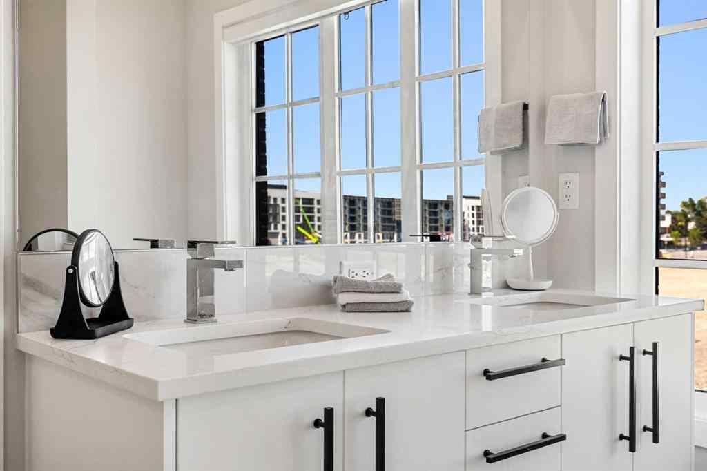 MLS® A2262942 - 8149 8 Avenue SW in West Springs Calgary, Residential