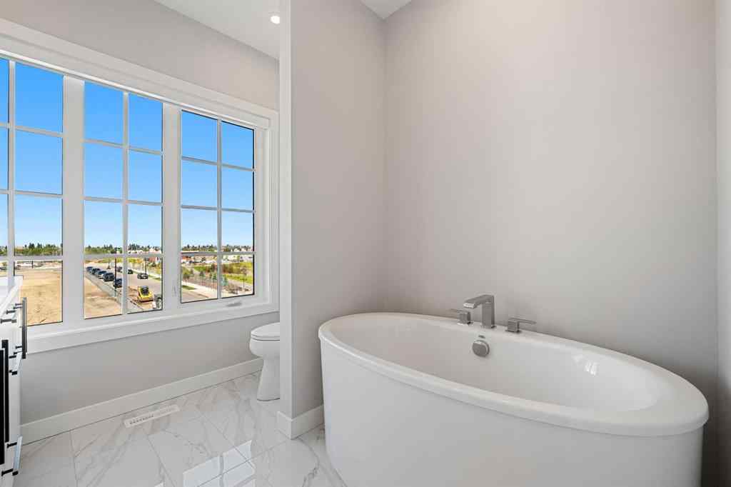 MLS® A2262942 - 8149 8 Avenue SW in West Springs Calgary, Residential