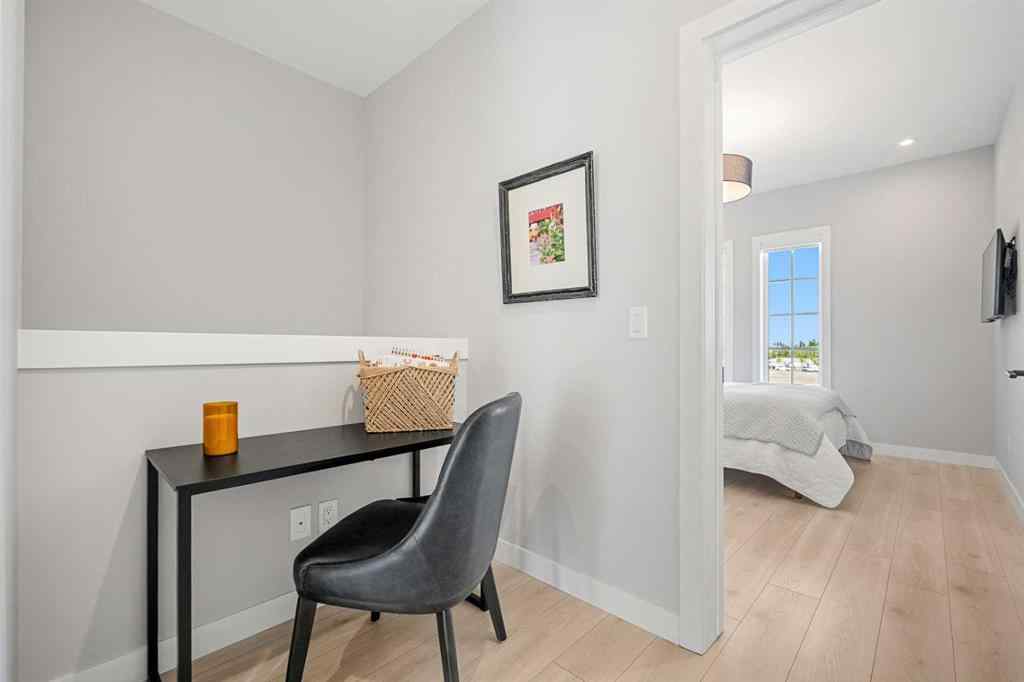 MLS® A2262942 - 8149 8 Avenue SW in West Springs Calgary, Residential