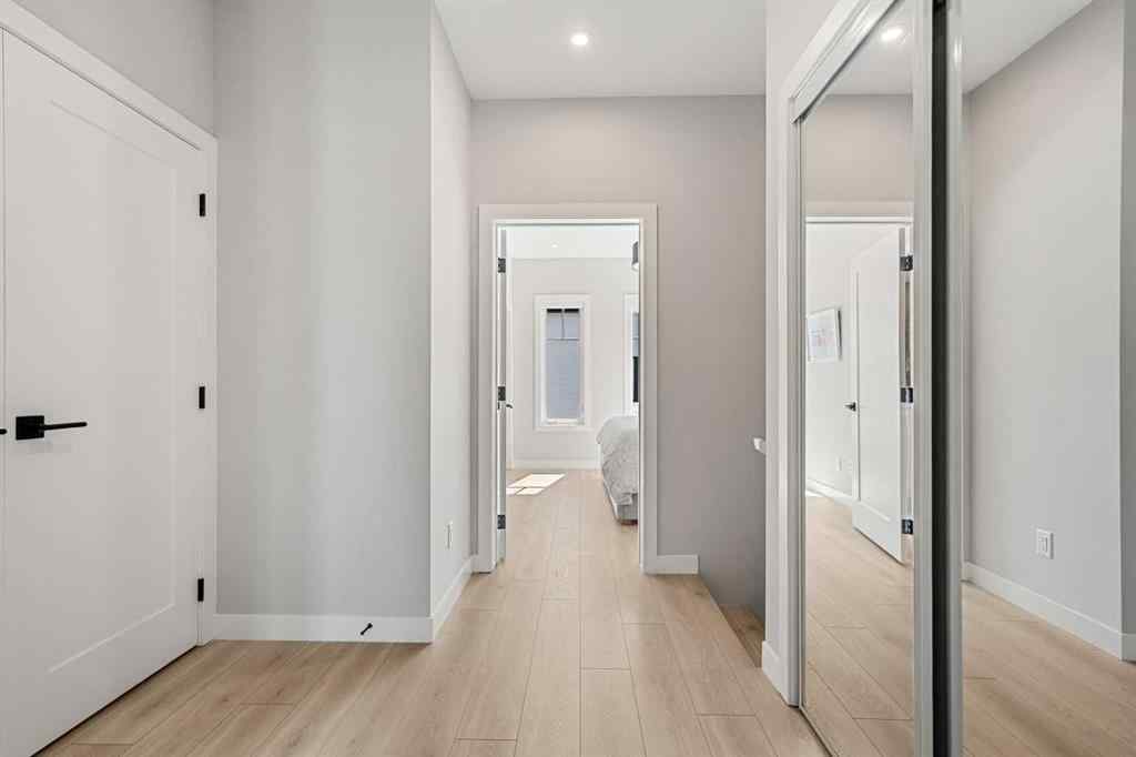 MLS® A2262942 - 8149 8 Avenue SW in West Springs Calgary, Residential