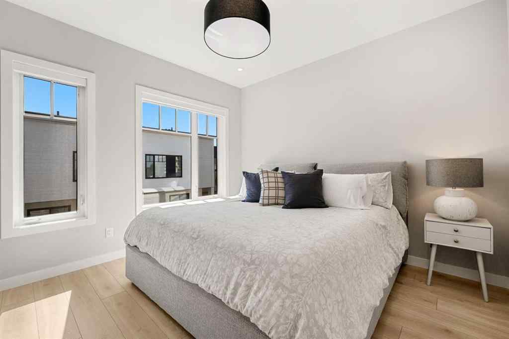 MLS® A2262942 - 8149 8 Avenue SW in West Springs Calgary, Residential