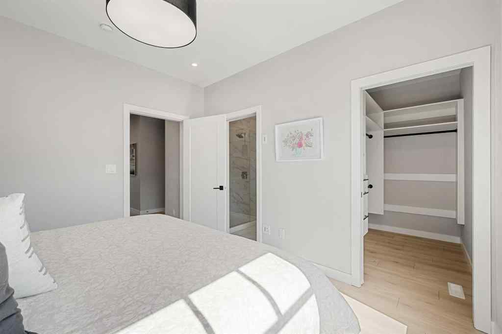 MLS® A2262942 - 8149 8 Avenue SW in West Springs Calgary, Residential