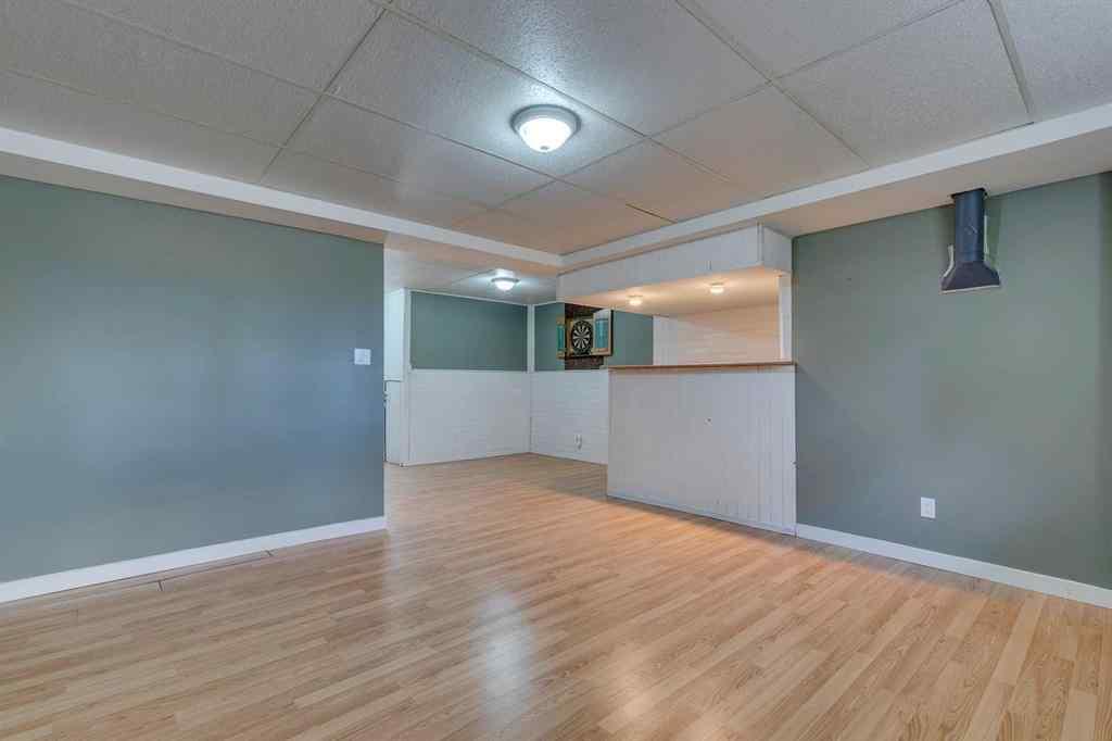 MLS® A2262950 - 108 Sunbank Way SE in Sundance Calgary, Residential