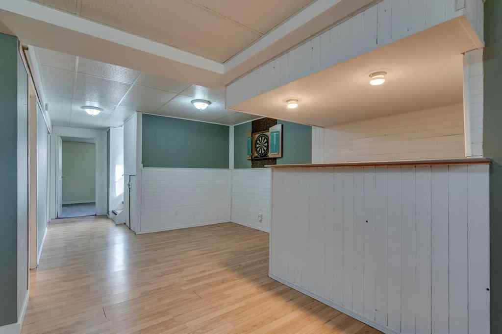 MLS® A2262950 - 108 Sunbank Way SE in Sundance Calgary, Residential