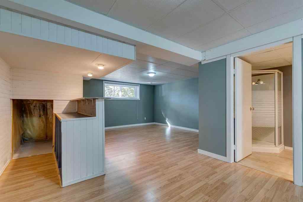 MLS® A2262950 - 108 Sunbank Way SE in Sundance Calgary, Residential