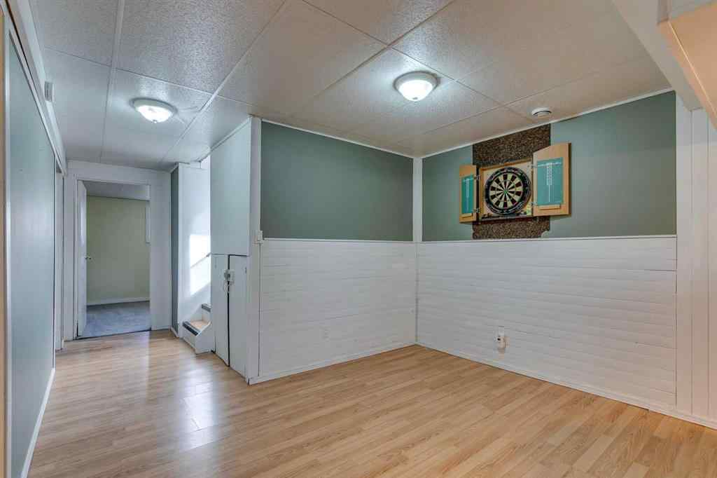 MLS® A2262950 - 108 Sunbank Way SE in Sundance Calgary, Residential