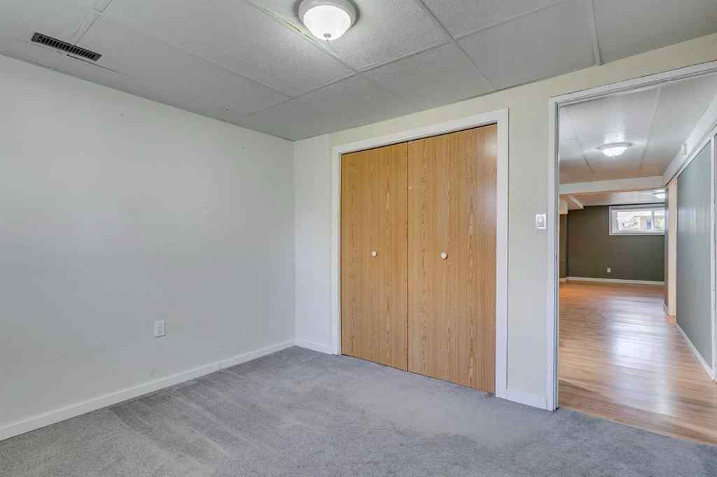 MLS® A2262950 - 108 Sunbank Way SE in Sundance Calgary, Residential