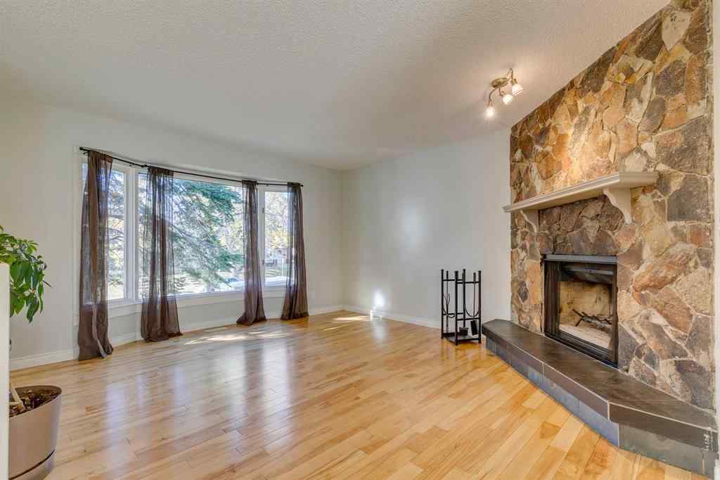 MLS® A2262950 - 108 Sunbank Way SE in Sundance Calgary, Residential