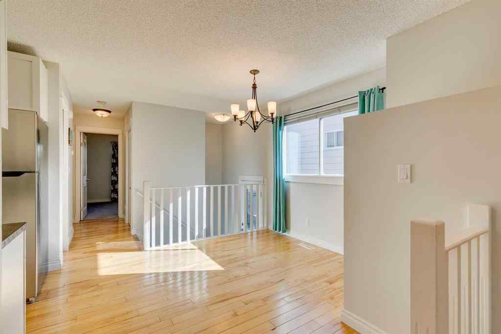 MLS® A2262950 - 108 Sunbank Way SE in Sundance Calgary, Residential