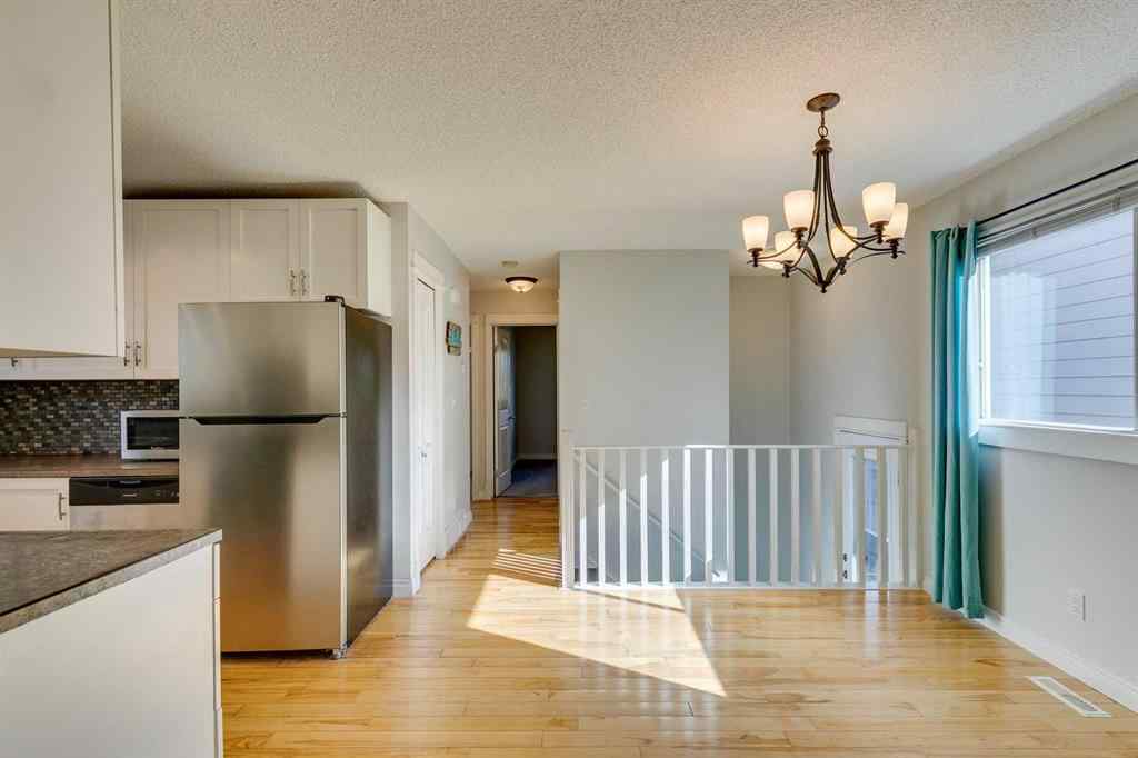 MLS® A2262950 - 108 Sunbank Way SE in Sundance Calgary, Residential