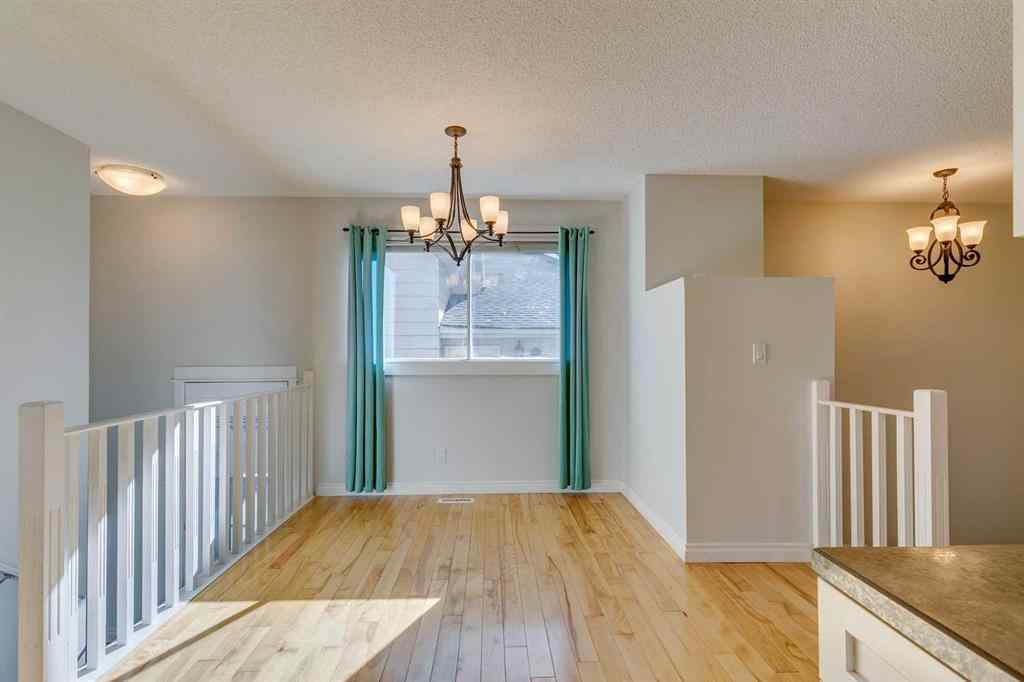 MLS® A2262950 - 108 Sunbank Way SE in Sundance Calgary, Residential