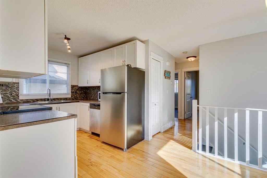 MLS® A2262950 - 108 Sunbank Way SE in Sundance Calgary, Residential