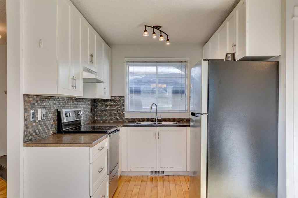 MLS® A2262950 - 108 Sunbank Way SE in Sundance Calgary, Residential