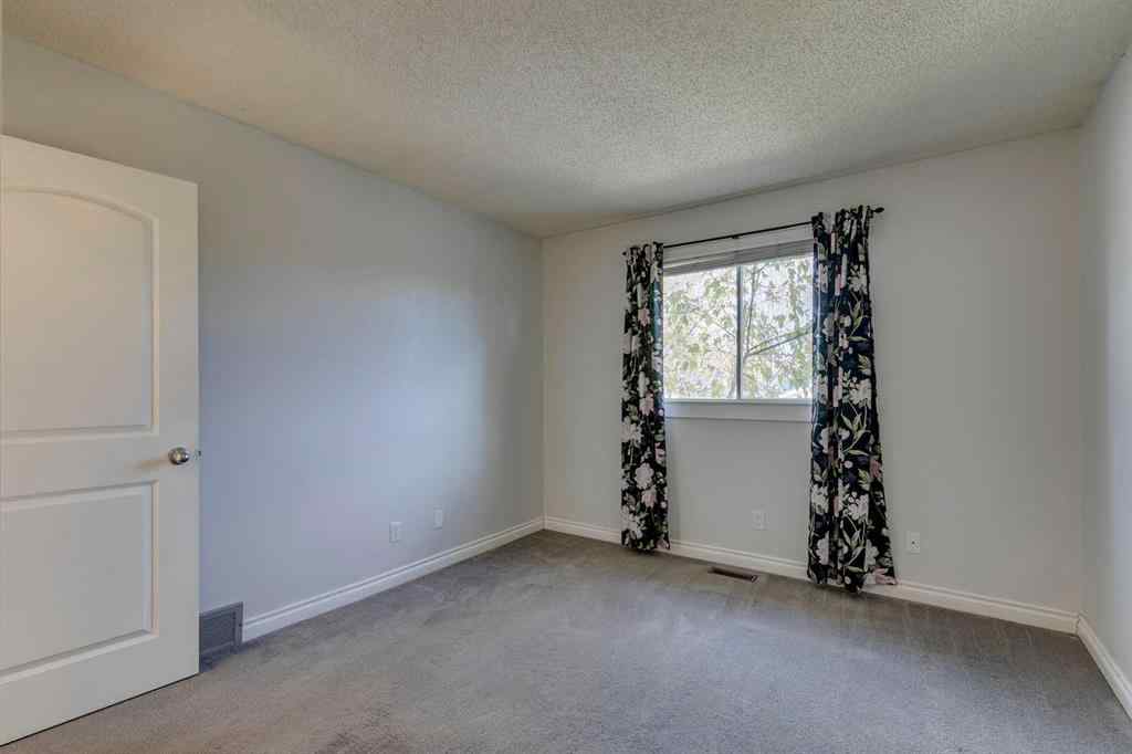 MLS® A2262950 - 108 Sunbank Way SE in Sundance Calgary, Residential