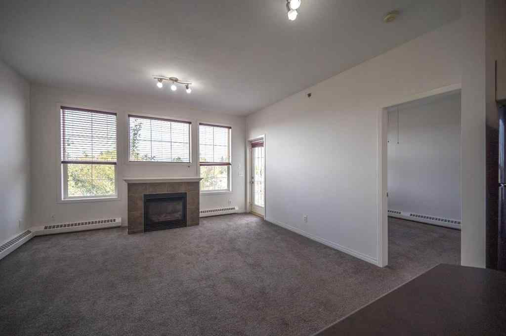 MLS® A2262965 - Unit #310 1000 Applevillage Court SE in Applewood Park Calgary, Residential