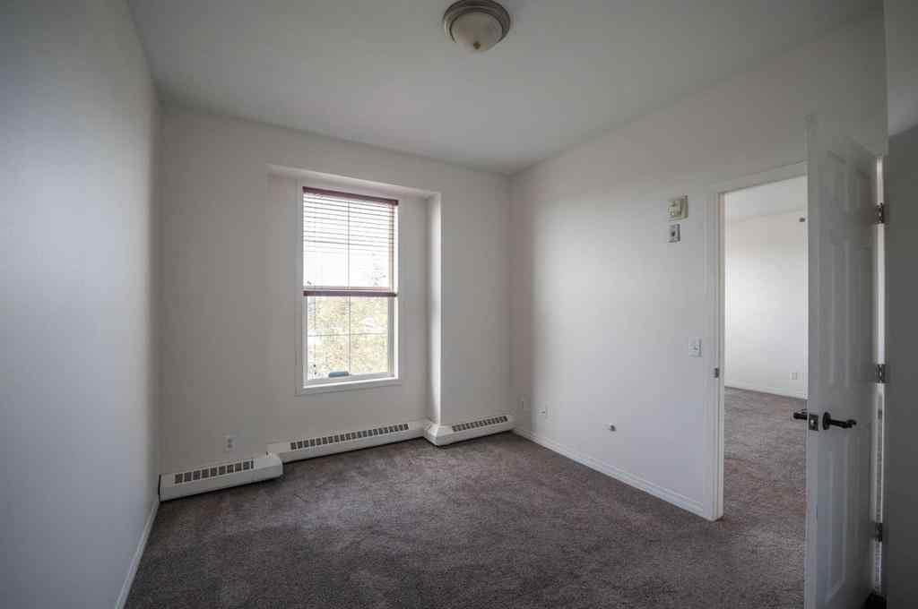 MLS® A2262965 - Unit #310 1000 Applevillage Court SE in Applewood Park Calgary, Residential