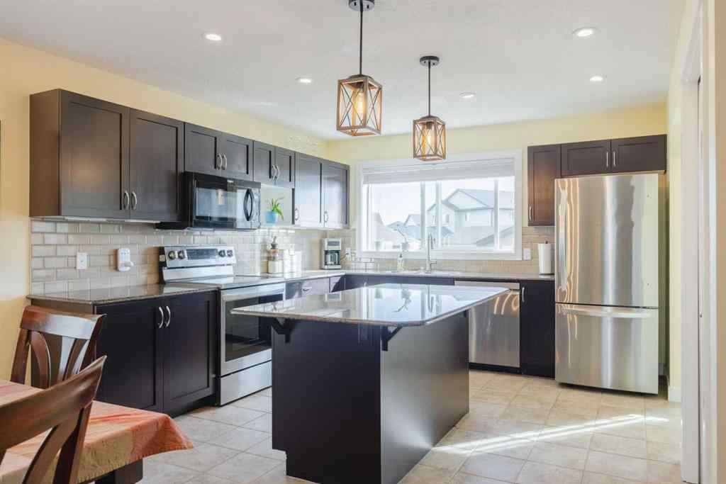 MLS® A2262970 - 47 Luxstone Point SW in Luxstone Airdrie, Residential