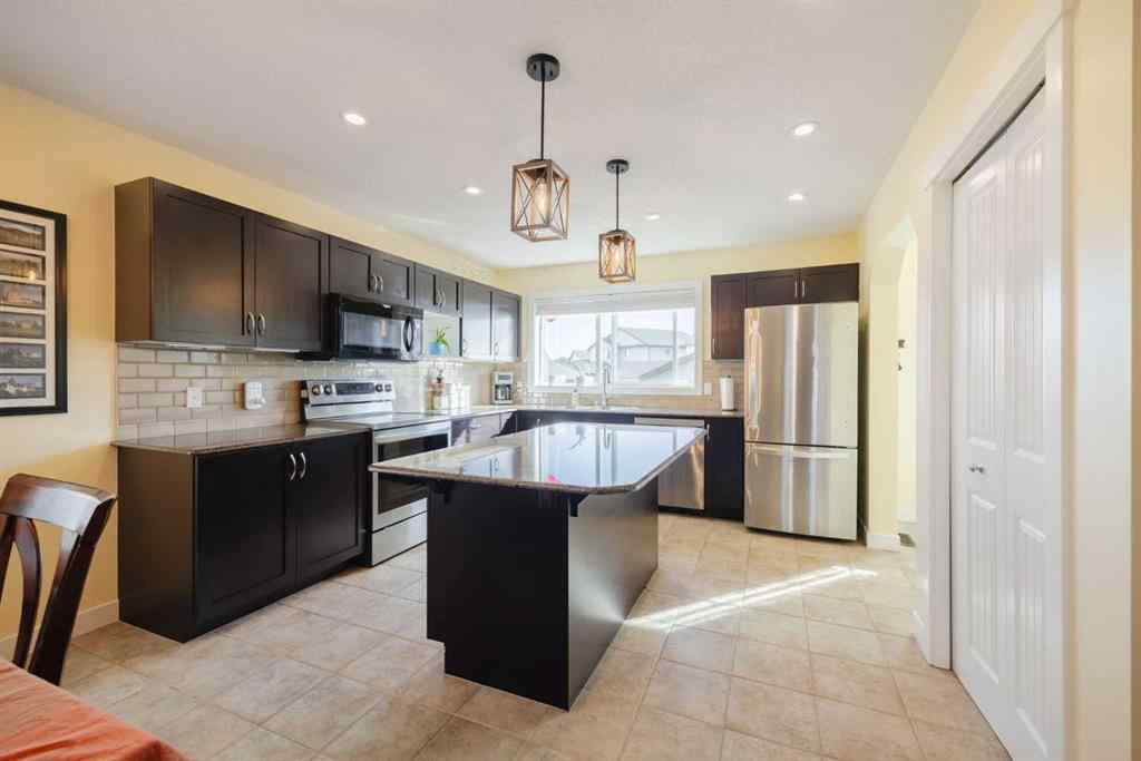 MLS® A2262970 - 47 Luxstone Point SW in Luxstone Airdrie, Residential