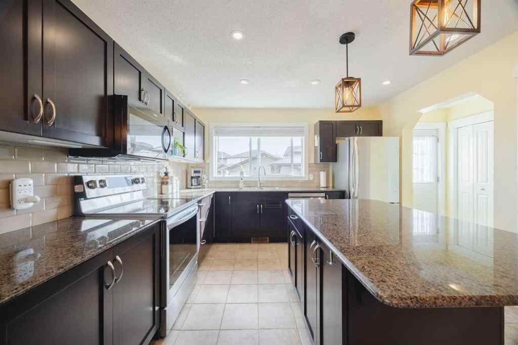 MLS® A2262970 - 47 Luxstone Point SW in Luxstone Airdrie, Residential