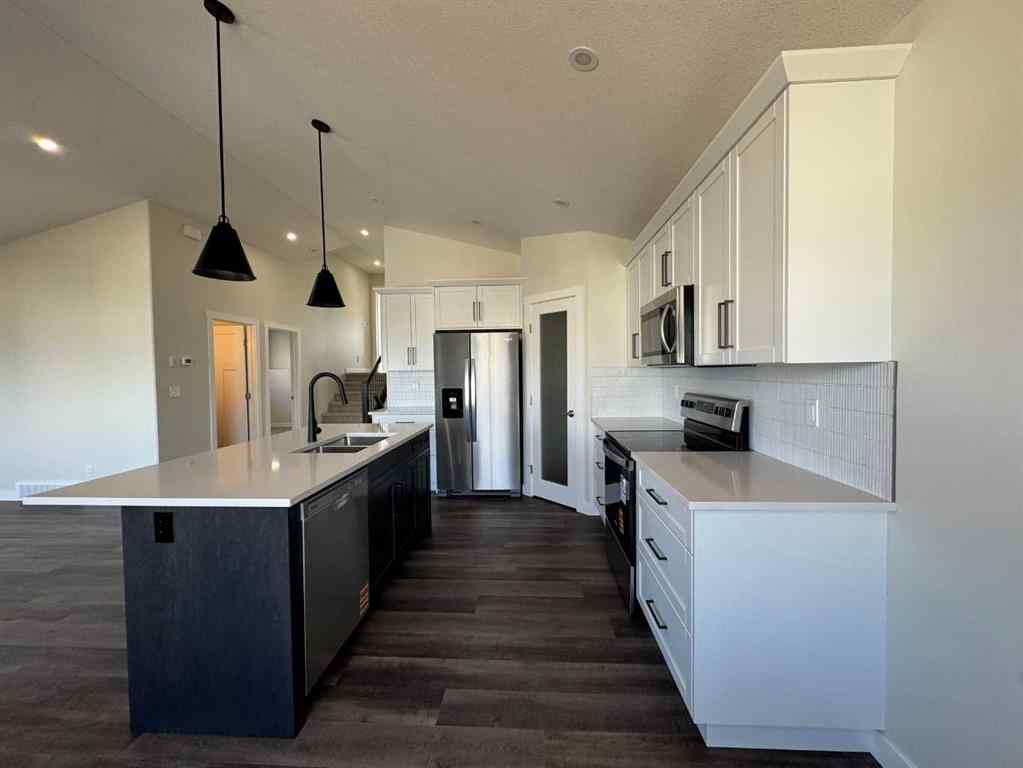 MLS® A2262993 - 21 Vermont Close  in Valley Ridge Blackfalds, Residential