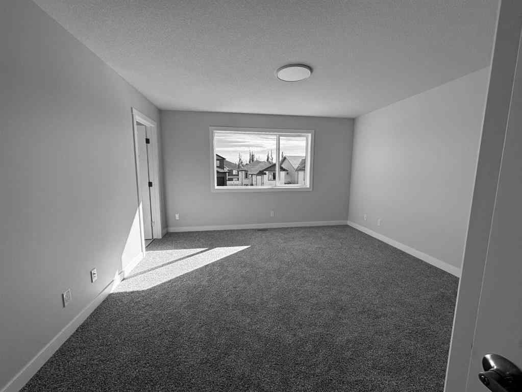 MLS® A2262993 - 21 Vermont Close  in Valley Ridge Blackfalds, Residential