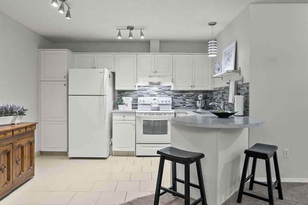 MLS® A2263002 - Unit #118 10 Sierra Morena Mews SW in Signal Hill Calgary, Residential