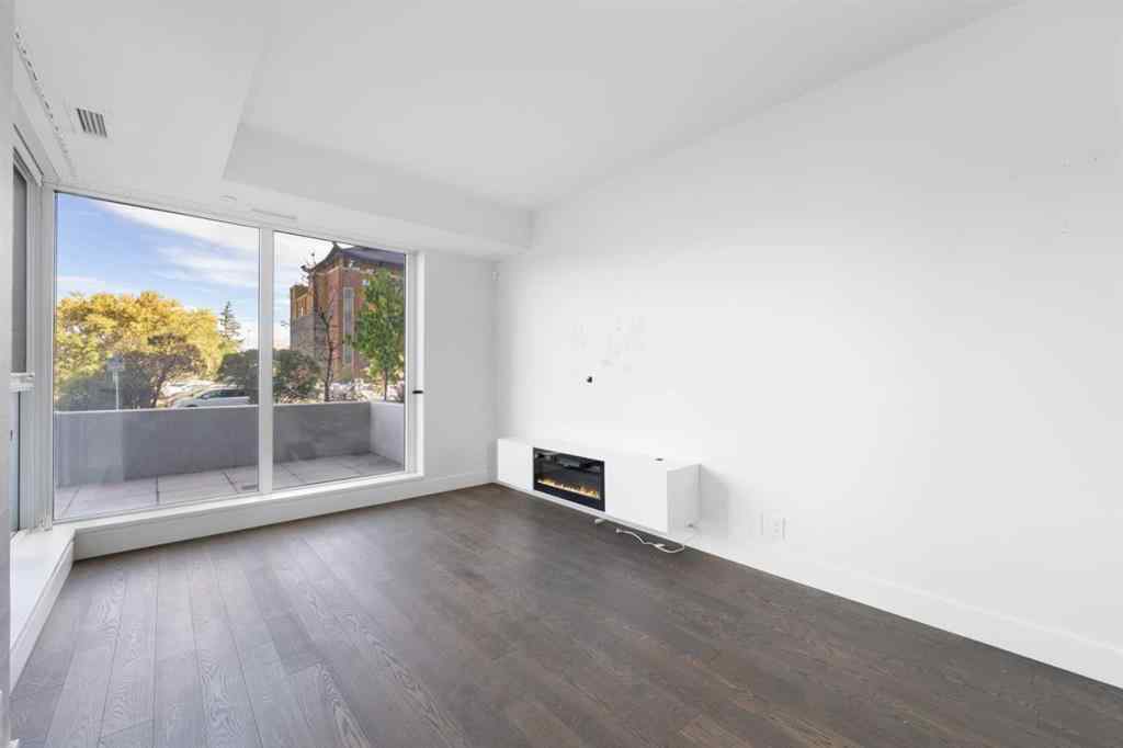 MLS® A2263025 - Unit #103 1025 5 Avenue SW in Downtown West End Calgary, Residential