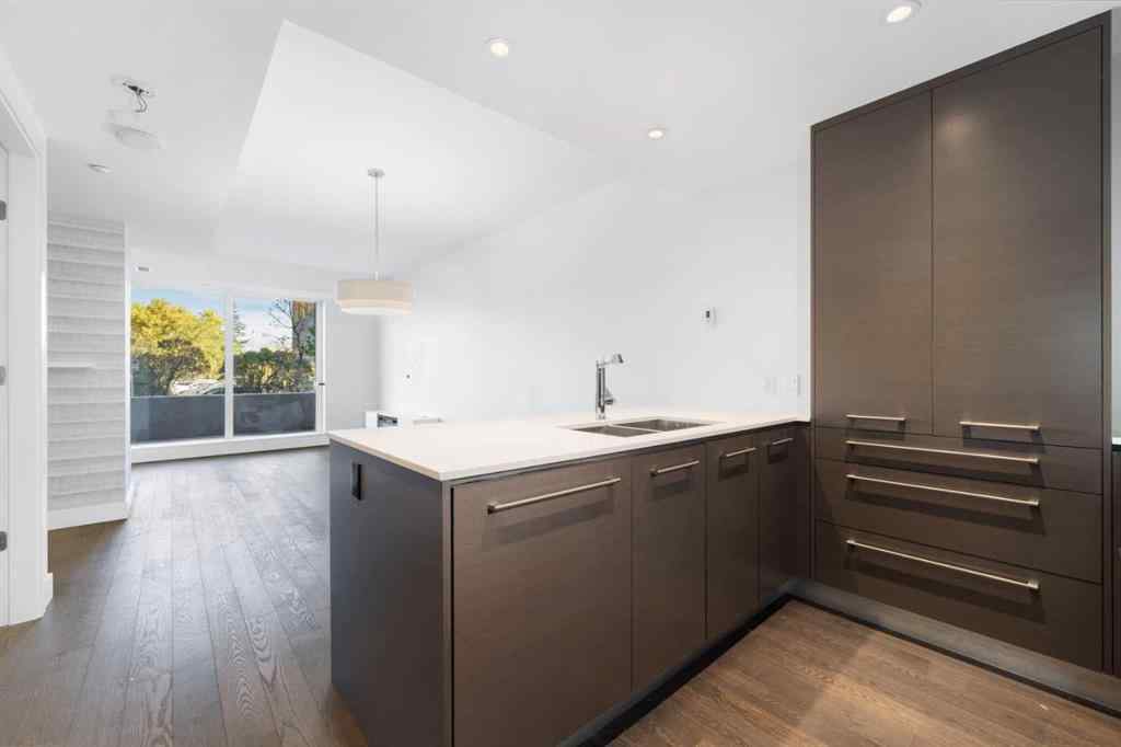 MLS® A2263025 - Unit #103 1025 5 Avenue SW in Downtown West End Calgary, Residential