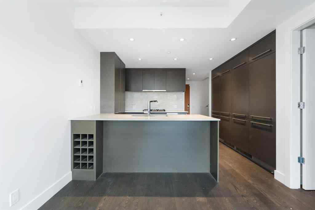 MLS® A2263025 - Unit #103 1025 5 Avenue SW in Downtown West End Calgary, Residential