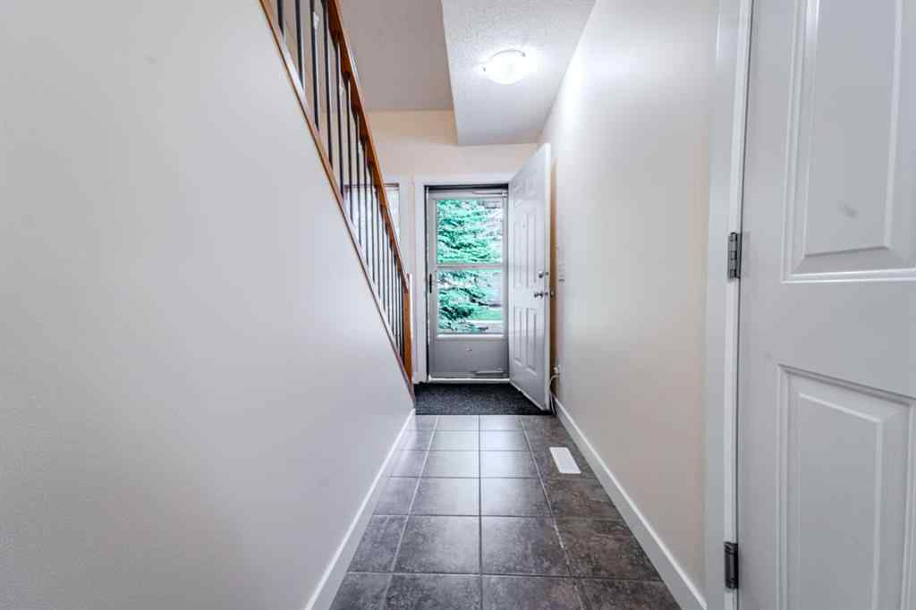 MLS® A2263026 - 310 Country Village Cape NE in Country Hills Village Calgary, Residential