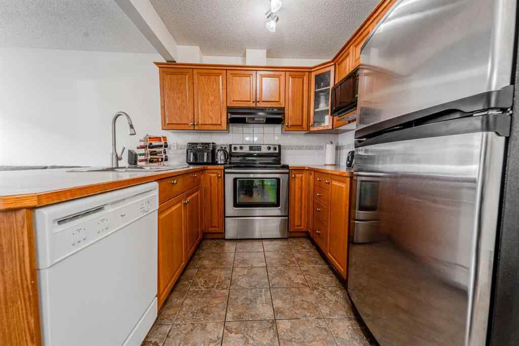 MLS® A2263026 - 310 Country Village Cape NE in Country Hills Village Calgary, Residential