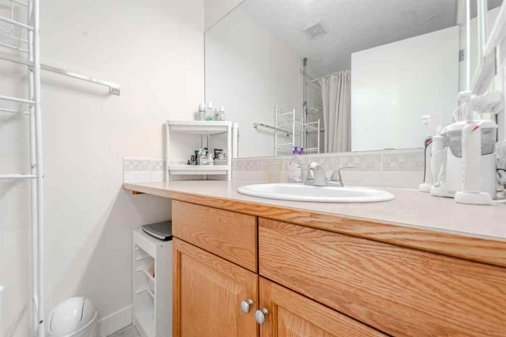 MLS® A2263026 - 310 Country Village Cape NE in Country Hills Village Calgary, Residential