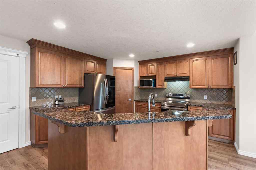 MLS® A2263037 - 7 Everglade Circle SW in Evergreen Calgary, Residential