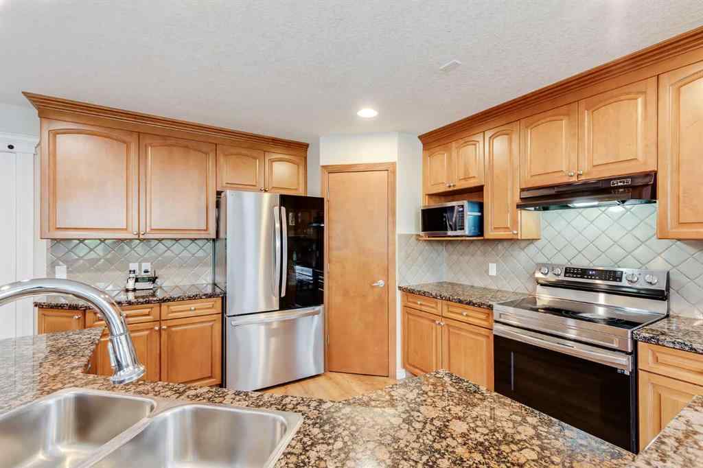 MLS® A2263037 - 7 Everglade Circle SW in Evergreen Calgary, Residential