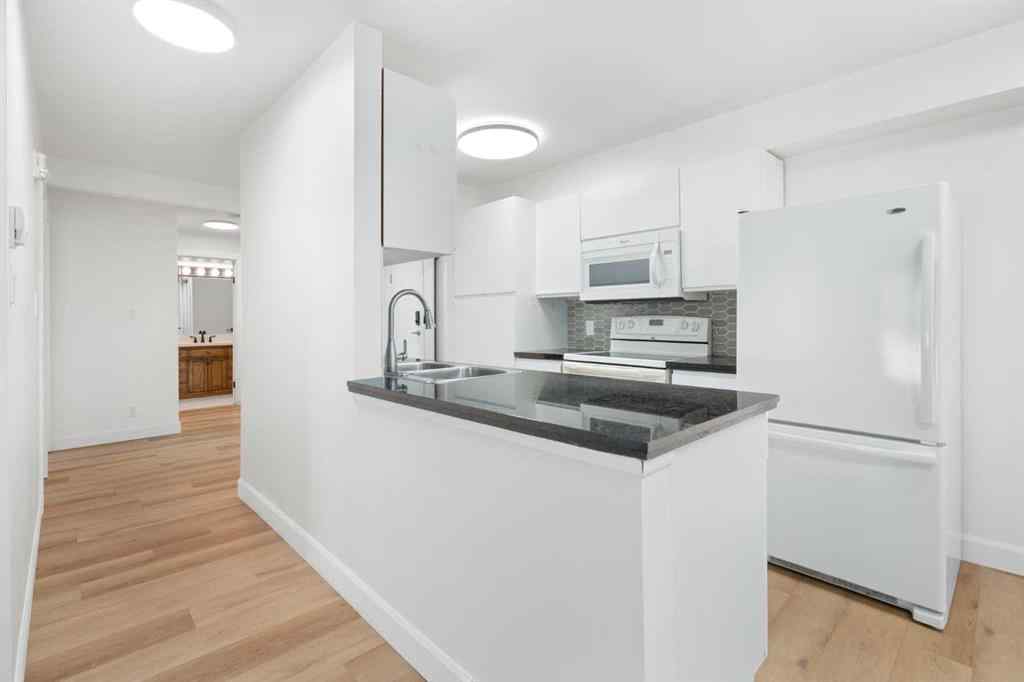 MLS® A2263044 - Unit #201 2221 14 Street SW in Bankview Calgary, Residential