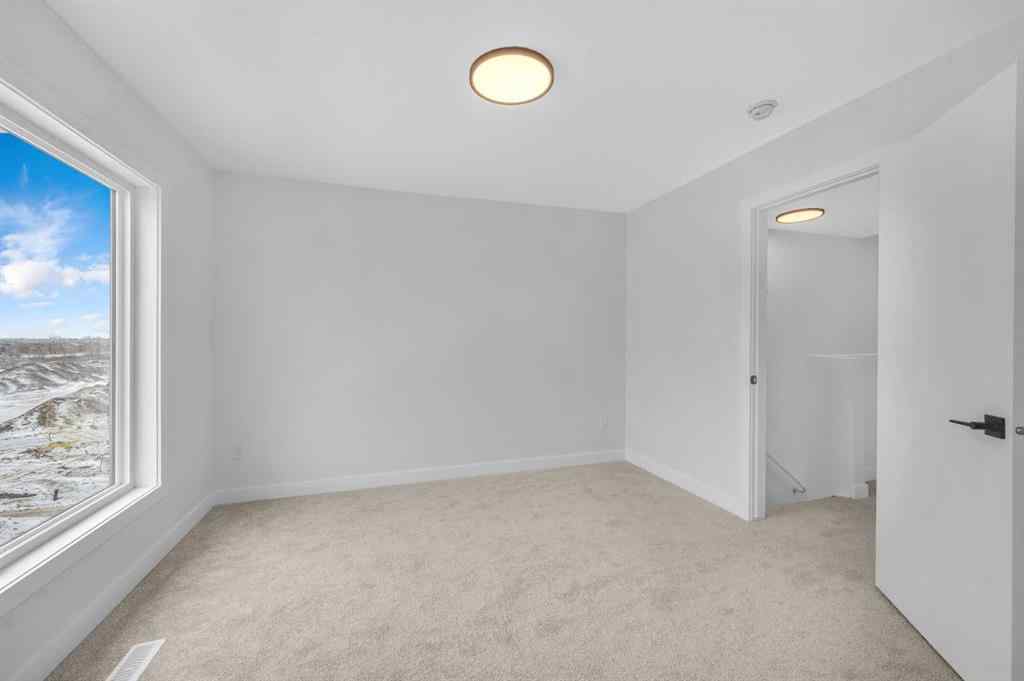 MLS® A2263047 - 8810 48 Street NE in Saddle Ridge Calgary, Residential