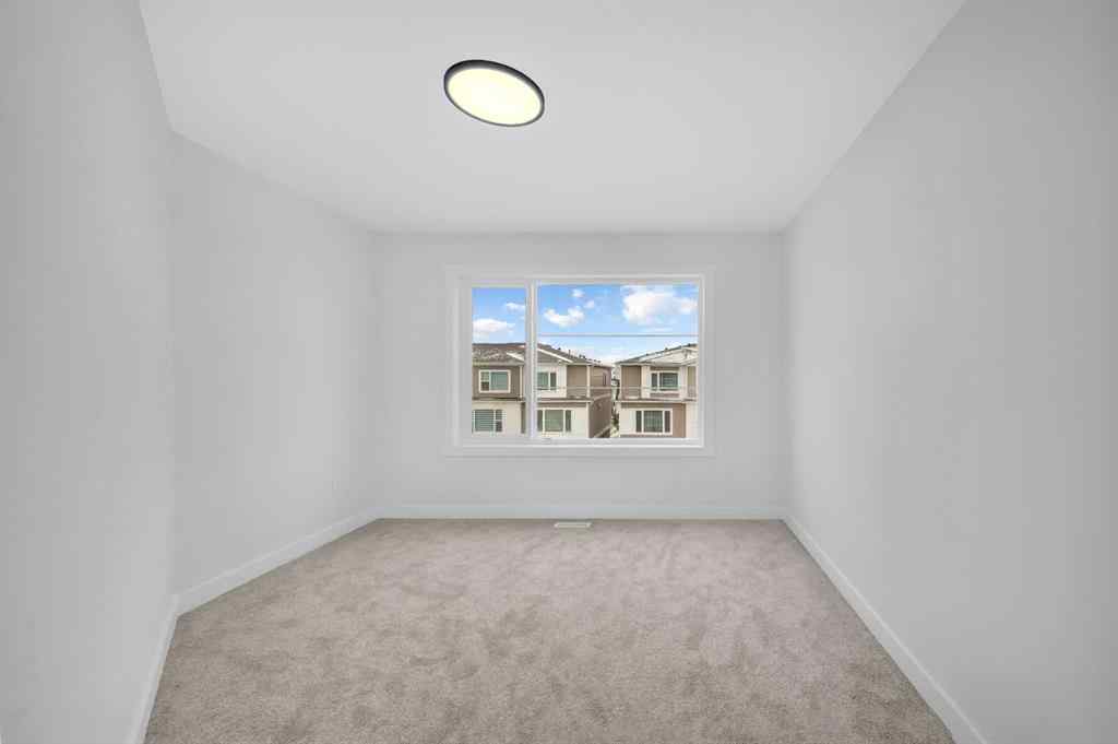 MLS® A2263047 - 8810 48 Street NE in Saddle Ridge Calgary, Residential