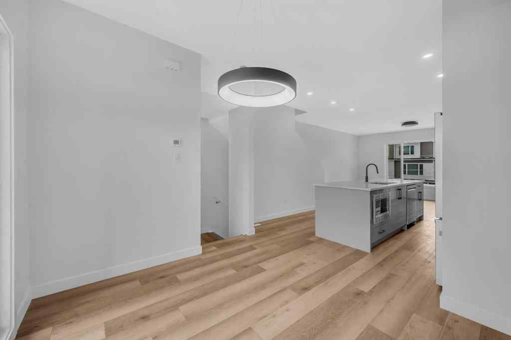 MLS® A2263047 - 8810 48 Street NE in Saddle Ridge Calgary, Residential