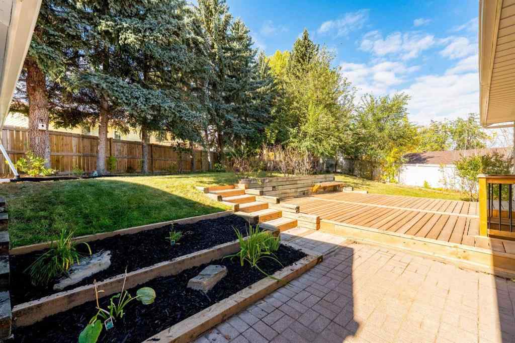 MLS® A2263067 - 328 Cantrell Place SW in Canyon Meadows Calgary, Residential