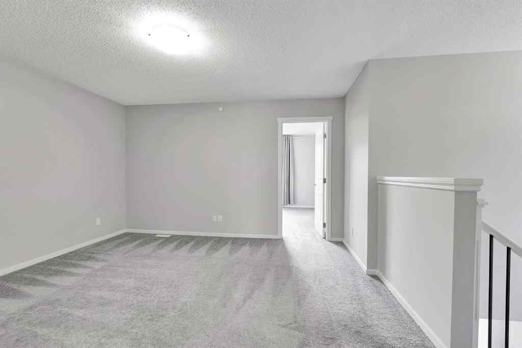 MLS® A2263068 - 106 Lucas Crescent NW in Livingston Calgary, Residential