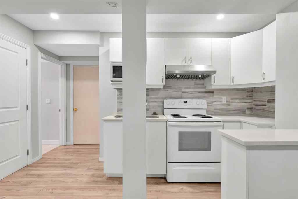 MLS® A2263068 - 106 Lucas Crescent NW in Livingston Calgary, Residential