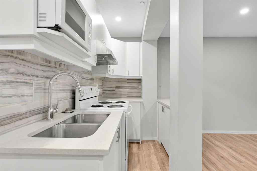 MLS® A2263068 - 106 Lucas Crescent NW in Livingston Calgary, Residential