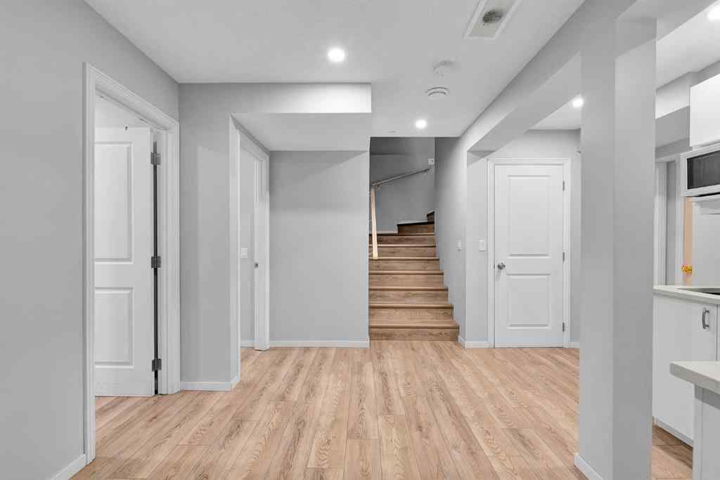 MLS® A2263068 - 106 Lucas Crescent NW in Livingston Calgary, Residential