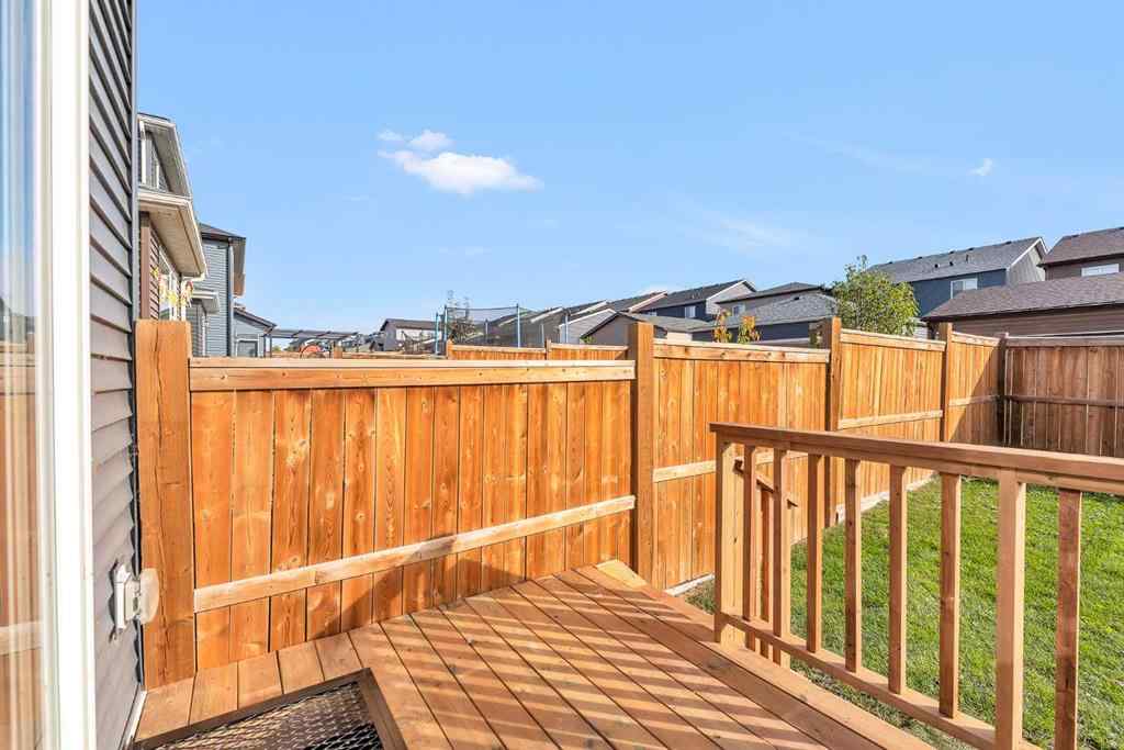 MLS® A2263068 - 106 Lucas Crescent NW in Livingston Calgary, Residential