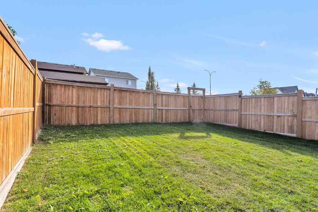 MLS® A2263068 - 106 Lucas Crescent NW in Livingston Calgary, Residential