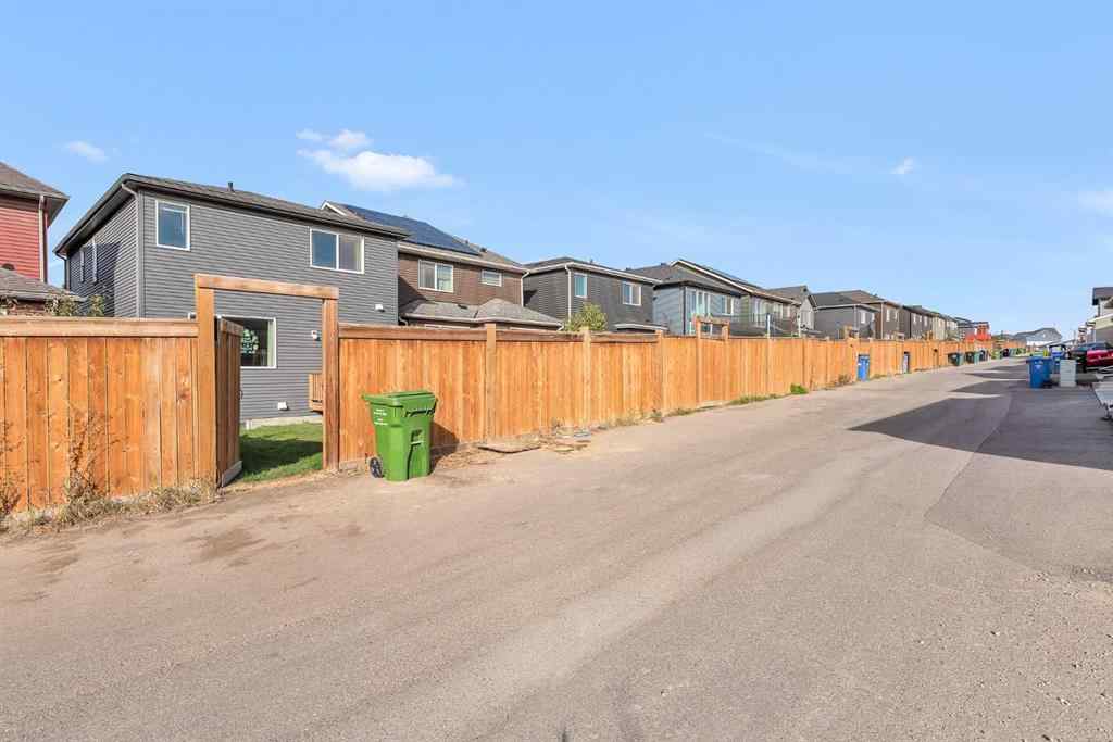 MLS® A2263068 - 106 Lucas Crescent NW in Livingston Calgary, Residential