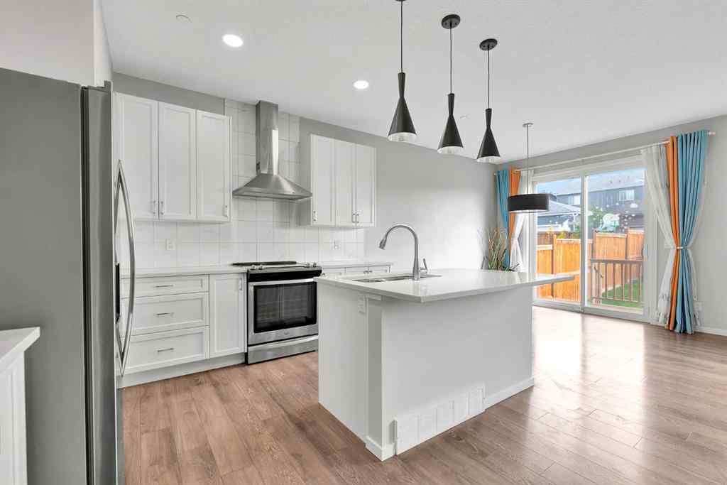 MLS® A2263068 - 106 Lucas Crescent NW in Livingston Calgary, Residential