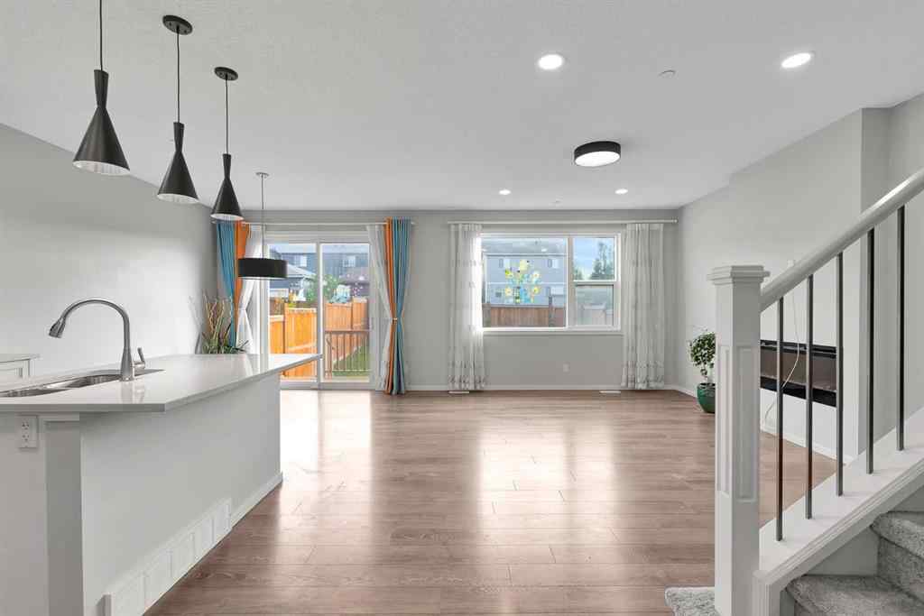 MLS® A2263068 - 106 Lucas Crescent NW in Livingston Calgary, Residential